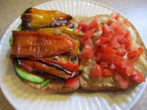 Roasted pepper, hummus, tomato & avocado sandwich- yum!